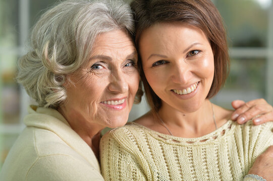 Portrait Of Cute Senior Woman With Daughter