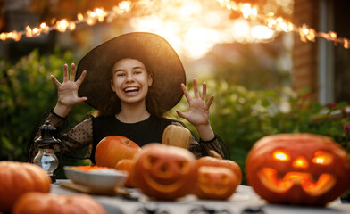 Happy girl preparing for Halloween