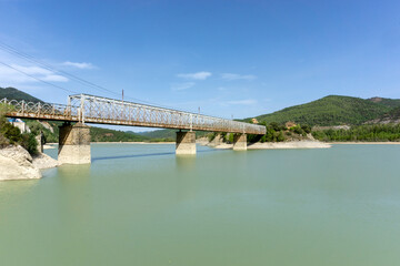 Fototapeta premium Metal bridge of the Peña reservoir (1913). Las Peñas de Riglos, Huesca, Spain.
