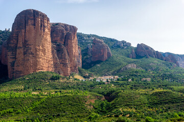 Fototapeta na wymiar Mallos de Riglos. They are geological formations consisting of rocks with vertical walls, called mallos, located in the Spanish town of Riglos, in the province of Huesca.