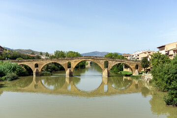Romanesque bridge over the Arga river (11th century). Puente la Reina, Navarre, Spain.