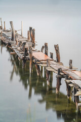 old wooden pier in the lake