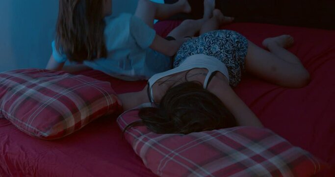 nosy partner - woman throws her partner who has taken all the space out of bed 