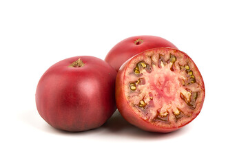 Whole and sliced organic tomatoes. Raw fresh tomatoes, isolated on white background.
