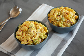 Homemade Classic Potato Salad in Bowls, side view.