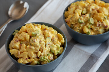 Homemade Classic Potato Salad in Bowls, side view.