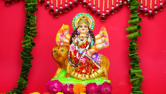 Goddess Durga idol at decorated Durga Puja pandal. Durga Puja is biggest religious festival of Hinduism and is now celebrated worldwide.
