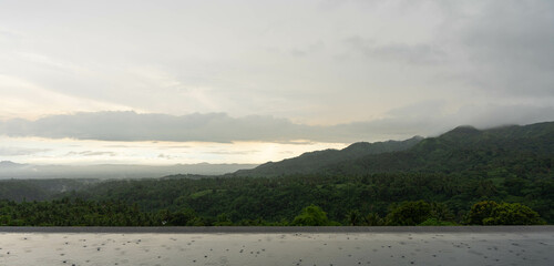 a mix of sunset and rainy weather of Mount Batulao