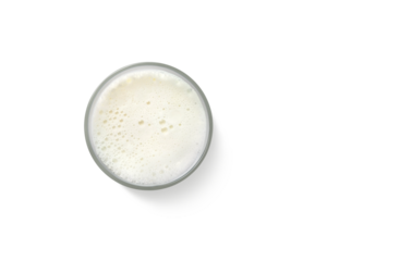 Milk foam in a glass. Top view isolated PNG transparent