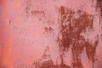 The background of an old, rusty iron sheet.