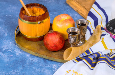Rosh hashanah exploring symbols of jewish new year holiday with apples, honey, pomegranate, Shofar