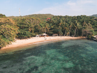 Aerial view of Kahyangan Beach in Karimunjawa Islands, Jepara, Indonesia. Remote Island, coral reefs, white sand beaches, long tail boat.