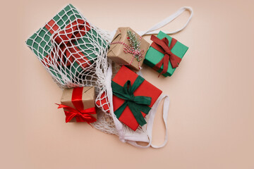 Zero waste, sustainable, green, eco-friendly holiday Eco-friendly mesh shopping bag with Gift boxes. Mesh Reusable Cotton Grocery Bag with Gifts