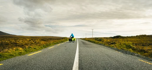 Papier Peint photo Atlantic Ocean Road Cyclist bicycle touring drive turn around on wild atlantic way road in Ireland. Travel adventure outdoors
