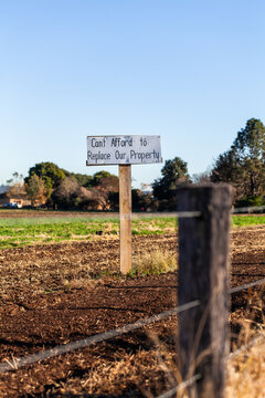 Cant afford to replace our property sign protesting forced land acquisition without fair comensation