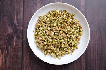 Sprouted moong beans. Protine rich salad. Healthy snack items. Sprouted Lentil Salad. Mixed with Onion, tomatoes, green chili and coriander. Copy space. Sprout Bhel.