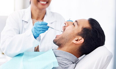 Man, dentist and check teeth with tools for dental cosmetics, healthcare assessment or medical...