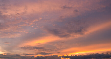  Panoramic view of sunset golden and blue sky nature background.
Colorful dramatic sky with cloud at sunset.Sky background.Sky with clouds at sunset.