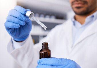 Scientist, hands and pipette with bottle for dosage, experiment or measurement in laboratory....