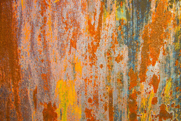 Old cracked paint in craquelure on a rusty metal surfaceGrunge rusted metal texture. Rusty...