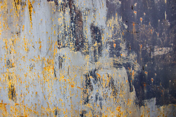 Old cracked paint in craquelure on a rusty metal surface Grunge rusted metal texture. Rusty corrosion and oxidized background. Worn metallic iron rusty metal background.