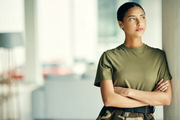 Army, idea and arms crossed with a woman soldier in uniform for safety, service or patriotism Military, thinking and a serious young war hero looking confident or ready for battle in camouflage - obrazy, fototapety, plakaty