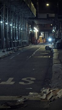 Gloomy Manhattan narrow street, night, vertical short video