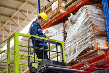 Warehouse Industrial supply chain and Logistics Companies inside. Warehouse workers checking the...