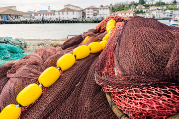 Pots, nets and fishing floats in a Cantabrian port. © Road Red Runner