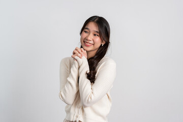 Happy cheerful young Asian girl with long light hair smiling brightly feeling happy with a positive expression, joyful surprise funky, Female in black with a big smile isolated on white background.