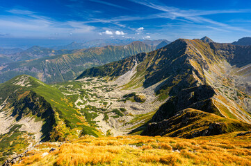 Panorama of the Tatra Mountains in autumn colors. View from the Mount Salatin.