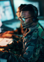 Military, call center and man on computer in office, data center and monitor for technical support,...