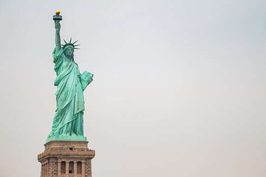 Statue of Liberty on its Base From the Front in a Full Shot with Sky in the Background