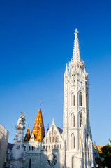 Fototapeta na wymiar Matthias Church and blue sky in Budapest, Hungary.