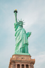 Statue of Liberty From the Front in a Vertical Medium Full Shot with Sky in the Background © Bento