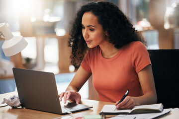 Laptop, office and business woman writing notes in office for planning, agenda and schedule in...