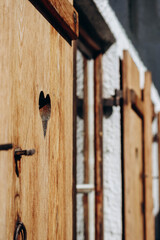 Beautiful wooden shutters with hearts in Bavaria, Germany