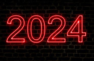 Night image of the number 2024 in red neon text on a brick wall. Concept new year.