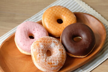 various type donuts on the tray