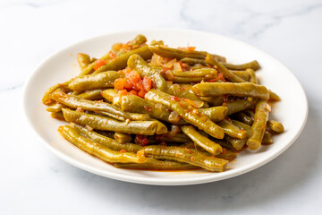 Traditional delicious Turkish food; Green beans with olive oil; Turkish name; Zeytinyagli taze fasulye