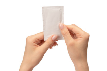 Wet wipe in a woman hand isolated on a white background.