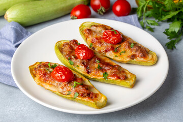 Zucchini stuffed with meat, vegetables and cheese. Zucchini boats. Turkish name; kabak sandal
