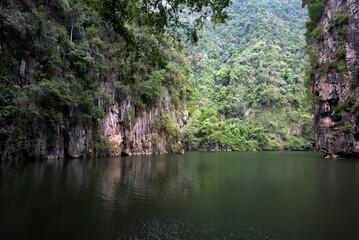Tasik Cermin or Mirror Lake, Ipoh, Malaysia - Tasik Cermin, or Mirror Lake, is a stunning hidden lake surrounded by limestone karst towers. Located near Ipoh town, Perak state, Malaysia.