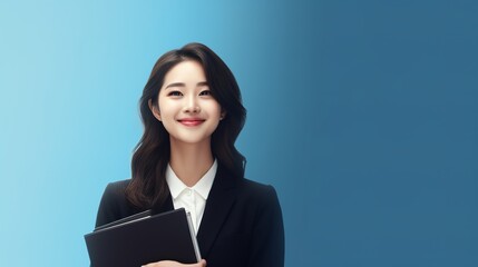 Obraz premium image of a businesswoman standing with her arms crossed on a blue background