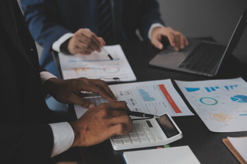 Obraz premium Financial Business woman analyze the graph of the company's performance to create profits and growth, Market research reports and income statistics, data,repotr,Financial and Accounting concept.