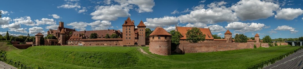 Fototapeta na wymiar Panorama of the Teutonic Castle in Malbork on a summer,sunny day.