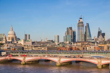 London cityscape with Blackfriars traffic and railway bridges in England
