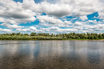 Beautiful landscape with river and cloudy sky