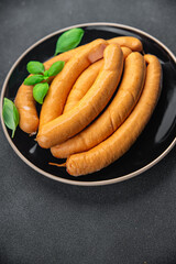 sausage chicken or turkey meat Cooking sausages appetizer meal food snack on the table copy space food background rustic top view