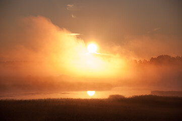 Sunrise and early morning fog in the Kokemäenjoki river delta in Pori, Finland